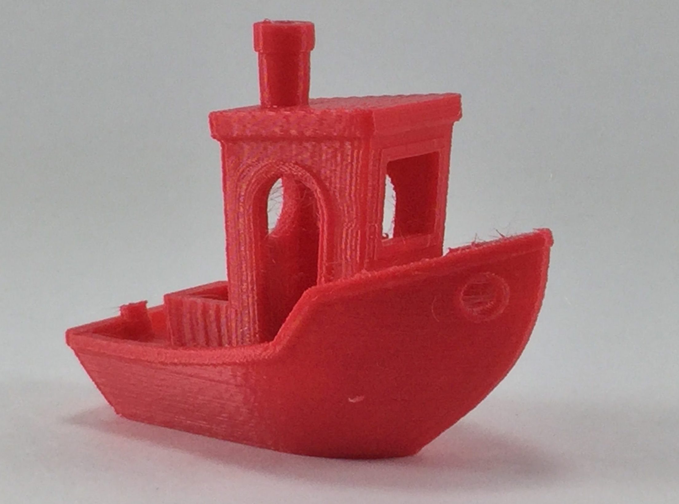 red pla benchy
